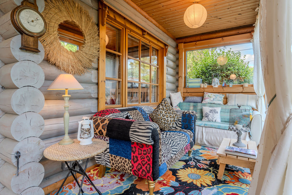 Colourful garden room in log cabin near Southwold Suffolk