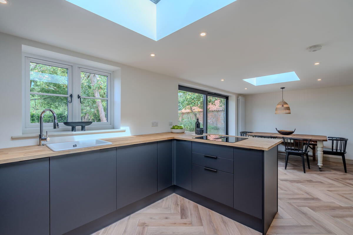 open plan kitchen photography showing view onto garden