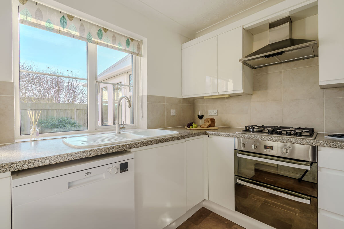 a bright looking kitchen in a modern holiday let