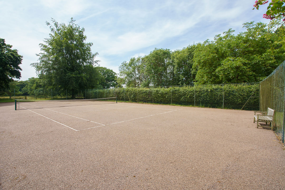 tennis-court a tennis court in the grounds of a country house in Norfolk