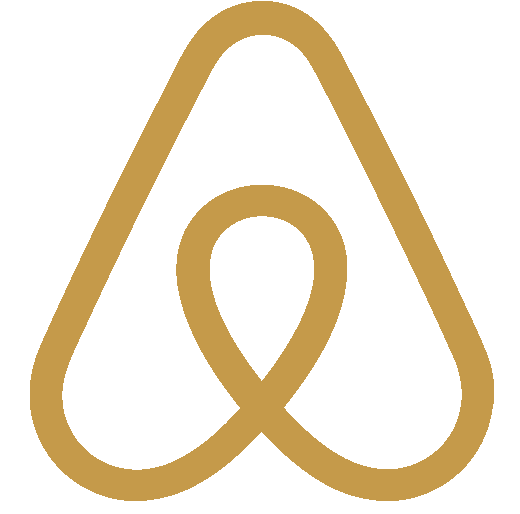 airbnb logo in gold